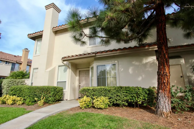 A bright, sunny day outside a large house in Chula Vista