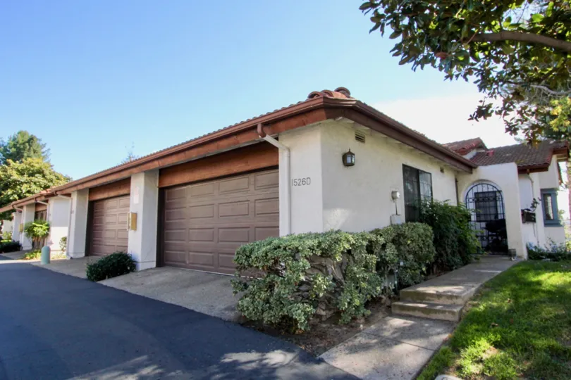 Two brown garages on a single story unit located in Chula Vista CA in Charter Point
