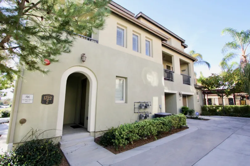 Neat plants line the front of a large home in the community of Clover, in Chula Vista, CA.