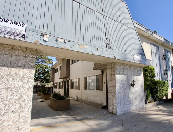 THE APARTMENT IN THE Continental Condos WITH THE ADVERTISEMENT BOARD, PLANTS