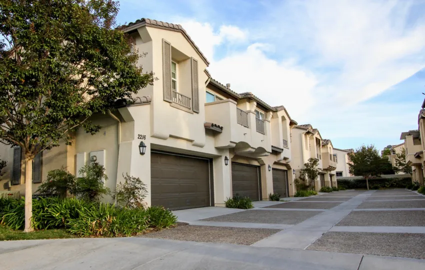 Driveway with large stone paved squares inside the Cortina at Chula Vista CA