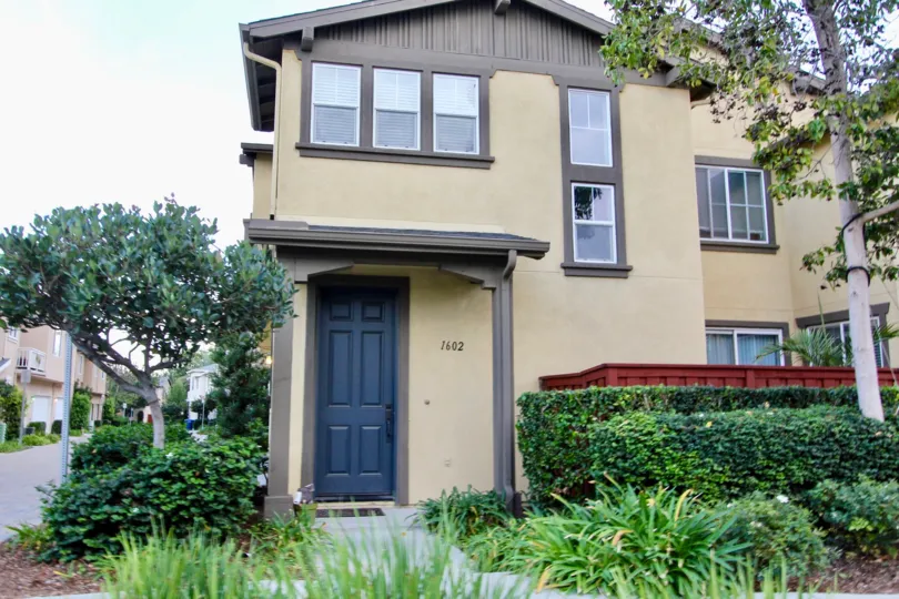 In front of house in Cottage Lane, Chula Vista, CA