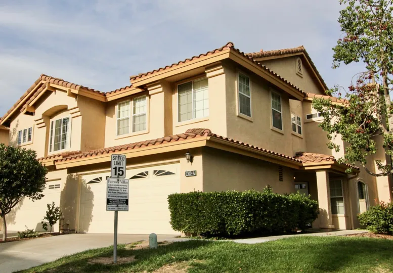 Home with two-car garage in a residential neighborhood.