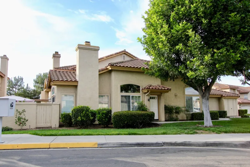 A Beautiful House with Lawn in a sunny day in Fairway Villas of Chula Vista