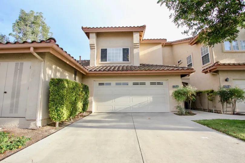 The front of a house on a sunny day in Fairway Villas in Chula Vista, California.