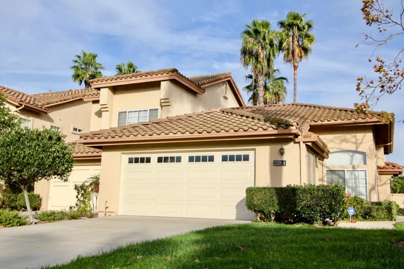 It is a partly cloudy day at the Fairway Villas in Chula Vista, California.