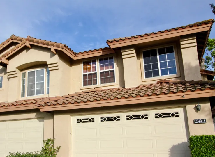 Terracotta tiled roofline with plenty of window and private garages at the Fairway Villas in Chula Vista, California