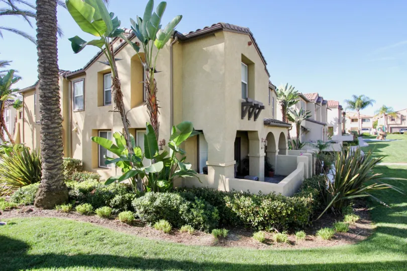a lush green and peaceful housing in Gold Rush of chula vista on a sunny day