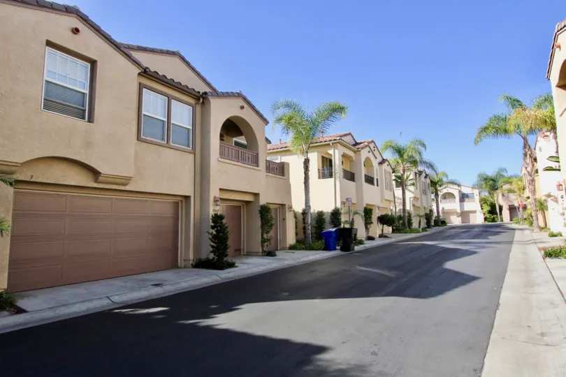 A gray driveway between condo units located in gold rush in chula vista ca