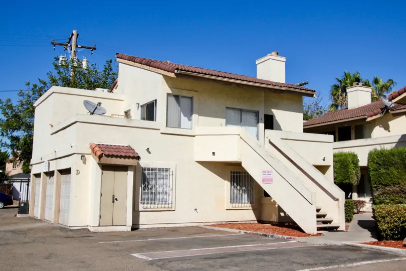 House with Open area before the parking area with roofed top and with dish attenna
