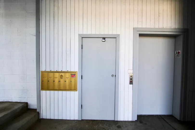 lift and a door by it, decently clean place with post boxes on the side on Kimball Terrace in chulla vista