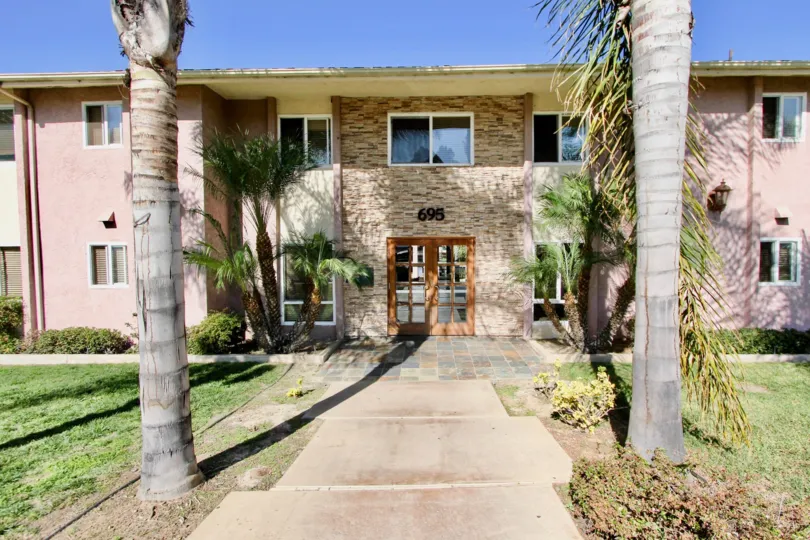 A Beautiful House with Lawn in front with trees in Las Palmas