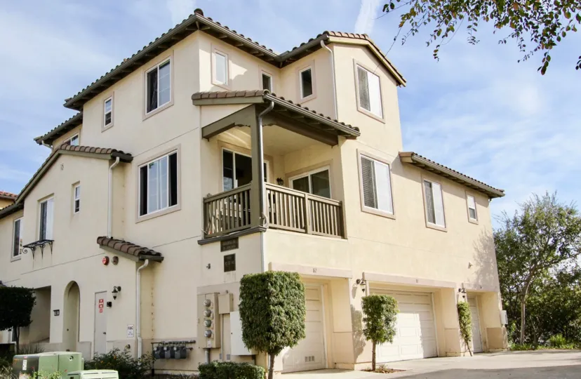 A balcony sits on the second floor of a three floor condo building at Mar Brisa