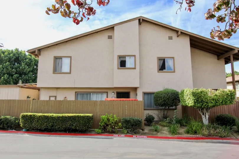 Rear view of Melrose Place Townhomes in Chula Vista, California on the street