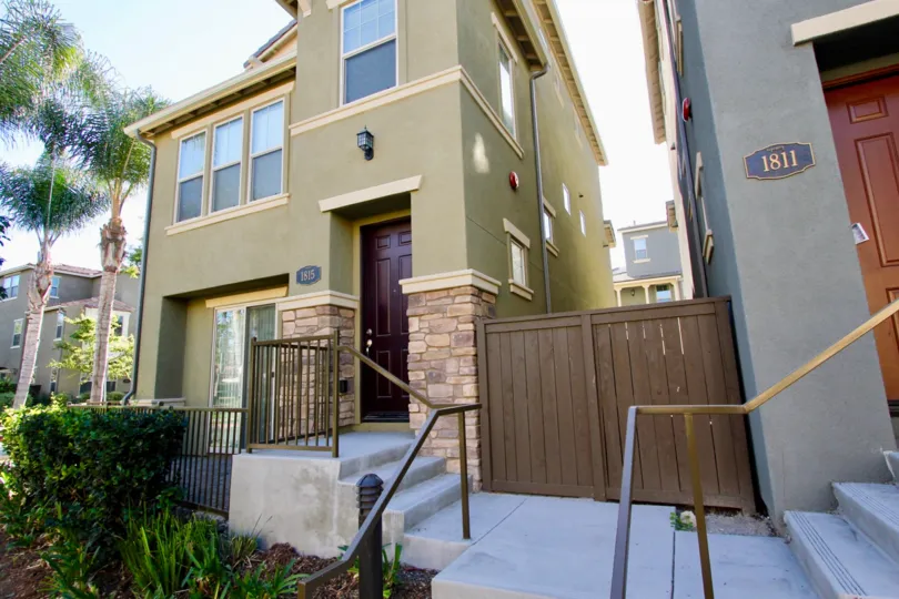 A SUNNY DAY IN THE MOSAIC WITH A APARTMENT WITH WOODEN DOOR, UPSTAIRS, PLANTS