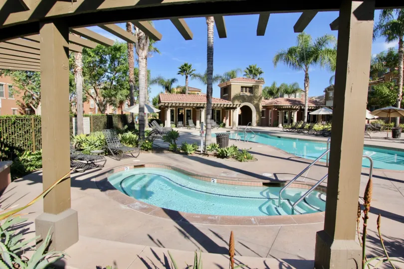 THE BUNGALOW IN THE MOSAIC WITH THE SWIMMING POOL, CHAIRS, TREES, PLANTS, UMBRELLA, CHILDREN SWIMMING POOL