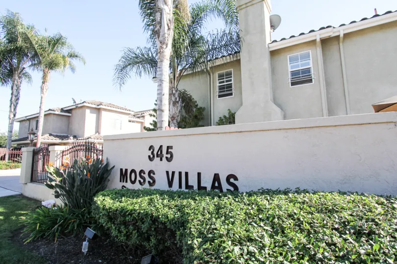 THE 345 HOUSE IN THE MOSS VILLAS WITH THE TREES, PLANTS, STEEL GATE