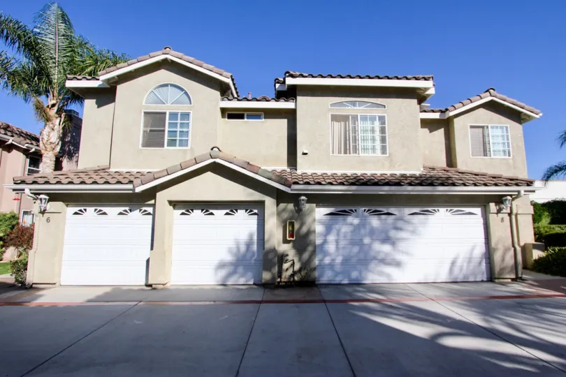 In Miss Villas a Chula Vista neighborhood a large cement house is on the corner.