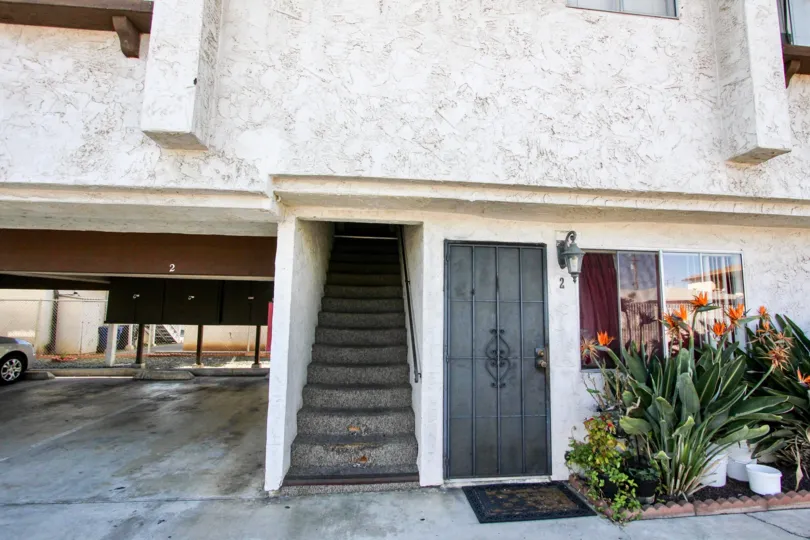 THE BUILDING IN THE PARK WAY VILLAS WITH THE CAR PARKING, FLOWER PLANT, UPSTAIRS