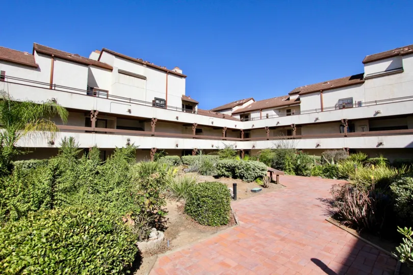 A plaza area with many green plants at Parkwoods in Chula Vista CA