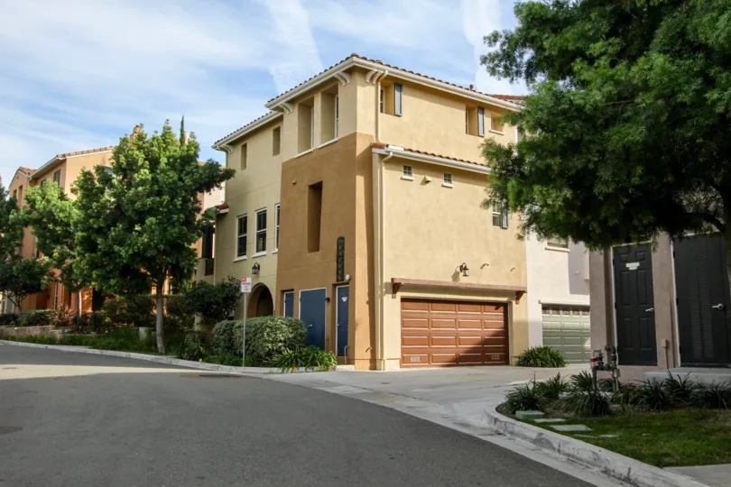 Three blue doors sit next to each other on a building in Sedona condos