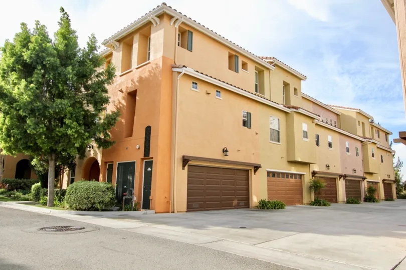 Side residence view with driving way and garage in Sedona, Chula Vista, CA