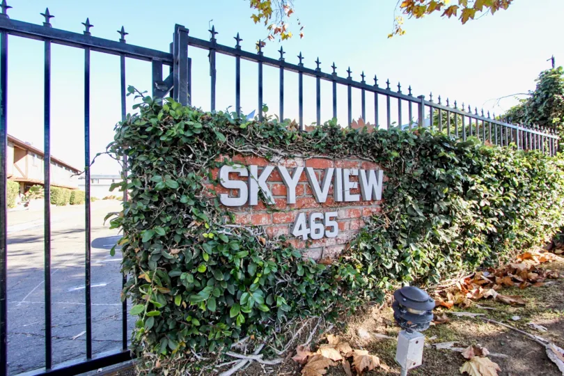 The gate of Skyview 465 with exterior lights at night time