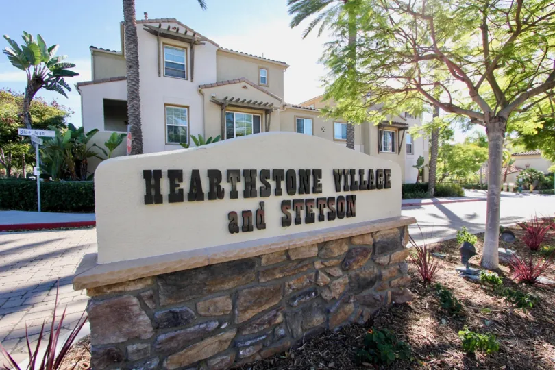 THE APARTMENT IN THE STETSON WITH THE HEARTHSTONE VILLAGE AND STETSON BOARD, TREES, PLANTS