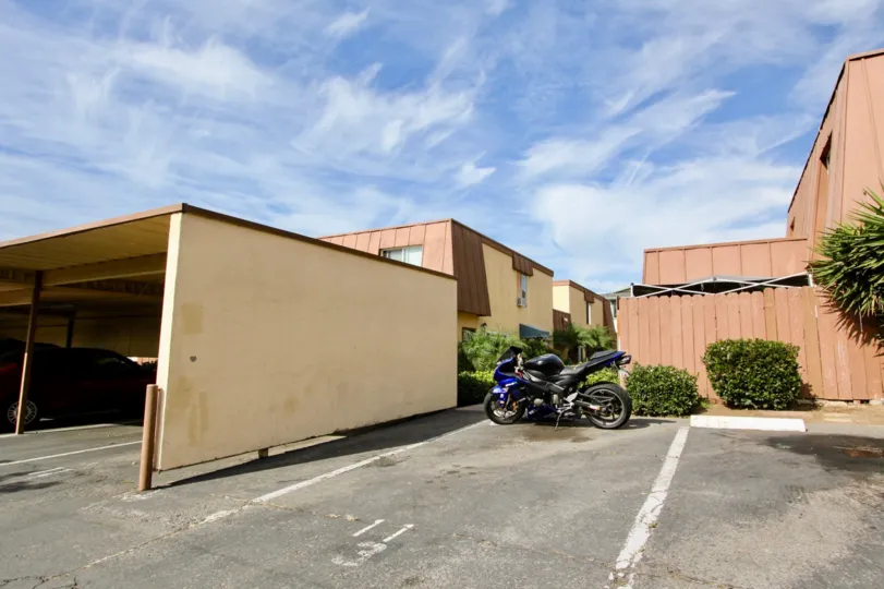 Bike standing near to the car shed near to the buildings in Stonebridge II