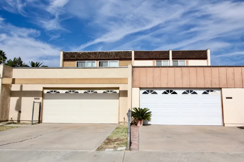 A sunny day in the area of Stonebridge II, outside, potted plant, garages, condos