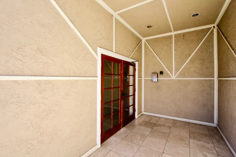A NICE ROOM WITH BROWN COLOUR DOOR WITH 3DIMENSIONAL