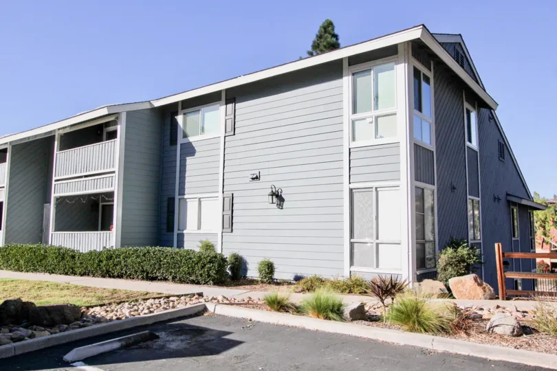 A modern townhouse unit with parking space of the Telegraph Canyon Terrace community.