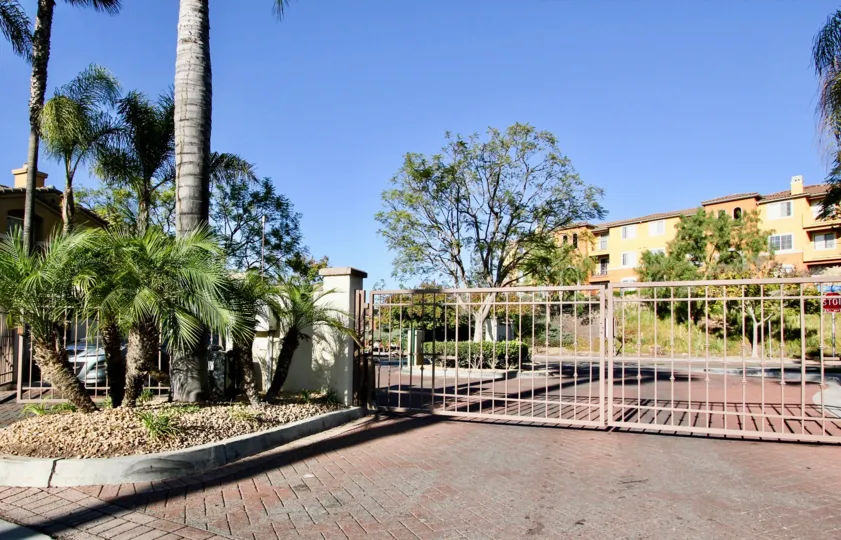 The exterior view of Tivoli Villas and the gated community entrance in Chula Vista