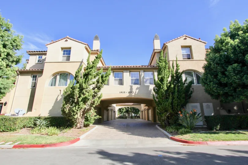 Driveway into the Treviana with trees lining the sides in Chula VIsta, Ca.
