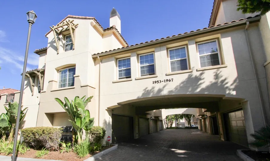 The exterior view of 1953-1967 Treviana and garage entrances in Chula Vista