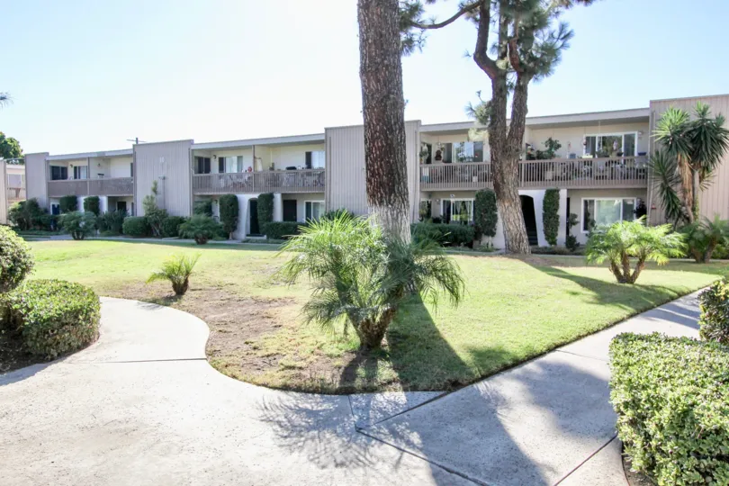 Front open space with trees of Villa Campestre, Chula Vista, CA