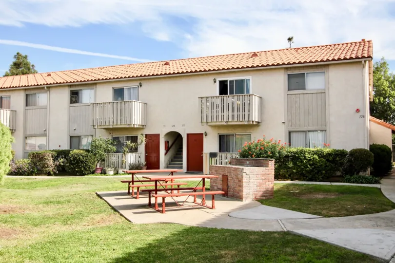 Sunny day front view with tables, Villa De Anita Community, Chula Vista, CA