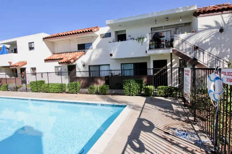 Swimming pool adjacent individual group homes in Villa Hermosa.