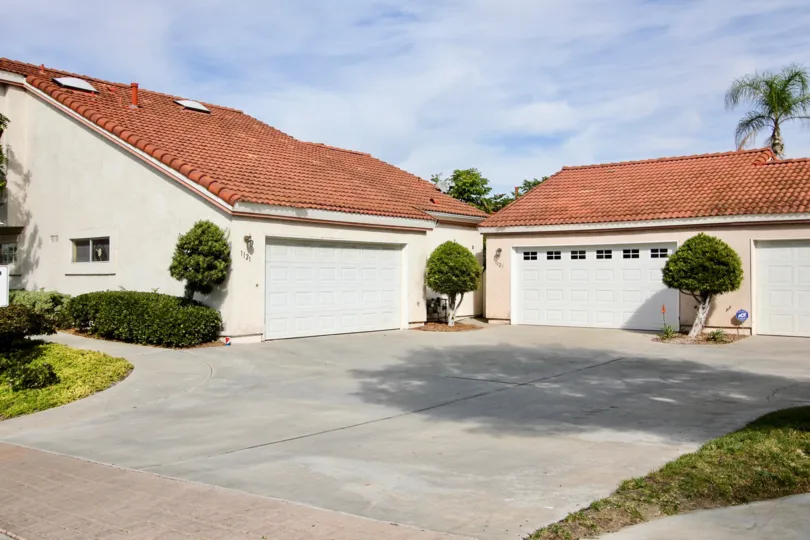 In front of a Residence home front open space with garage in Villa Palmera, Chula Vista, CA