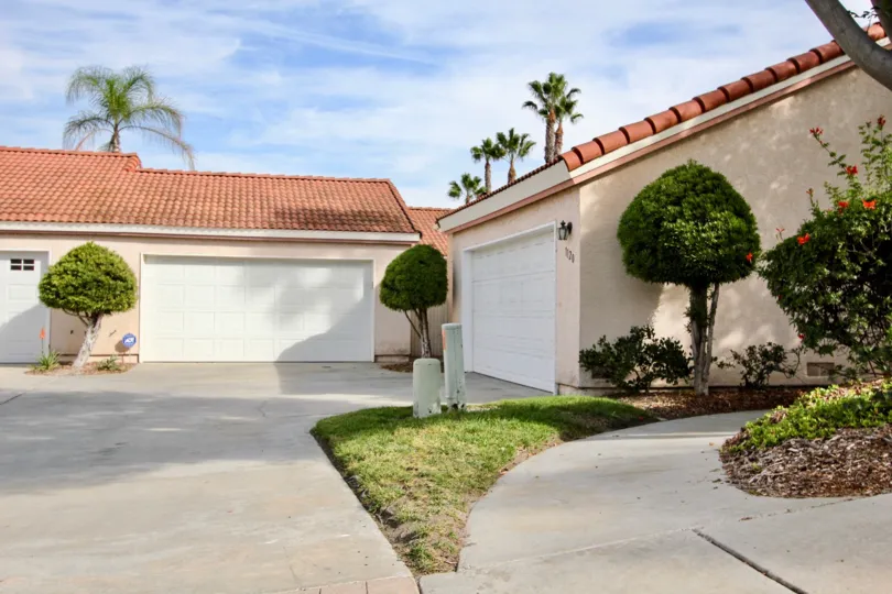 Beautiful Garden trees in front of villas in Villa Palmera of Chula Vista area