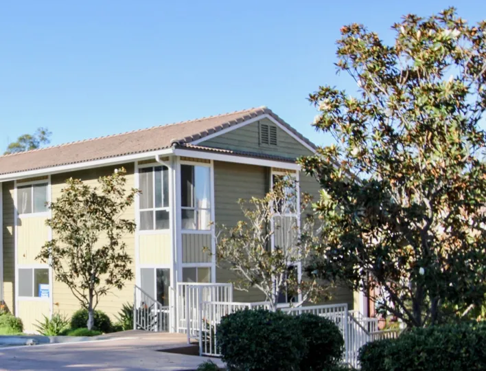 A sunny day in the area of Woodland Hills, porch, windows, condo, trees, outside