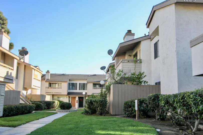 The sidewalk leading to apartments in the community of Woodside Village in Chula Vista, Ca.