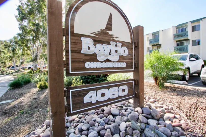 A wooden sign with white paint at the Bay Ho community in Clairemon Mesa California