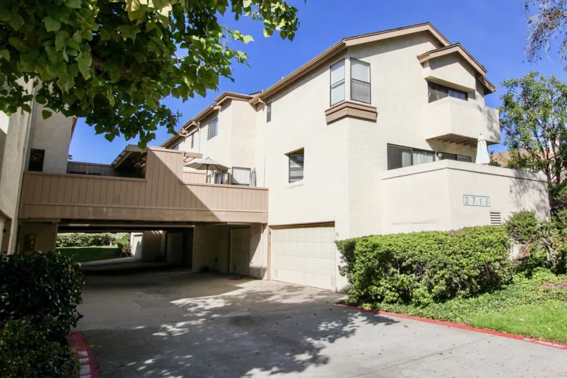 THE 2716 APARTMENT IN THE CANYON RIM WITH THE GRASSLAND, TREES, PLANTS, BALCONI
