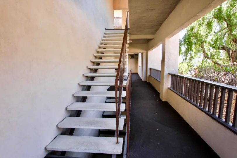 THE BUILDING IN THE COSTA VIVA WITH THE CORRIDOR, UPSTAIRS, TREES