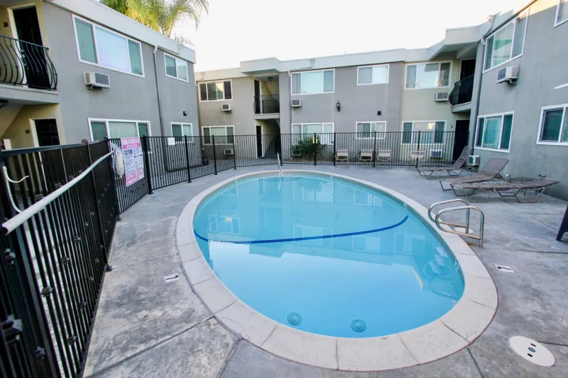 THE APARTMENT IN THE HERITAGE PARK WEST WITH THE SWIMMING POOL, STEEL GATE, GLASS WINDOW, CHAIRS