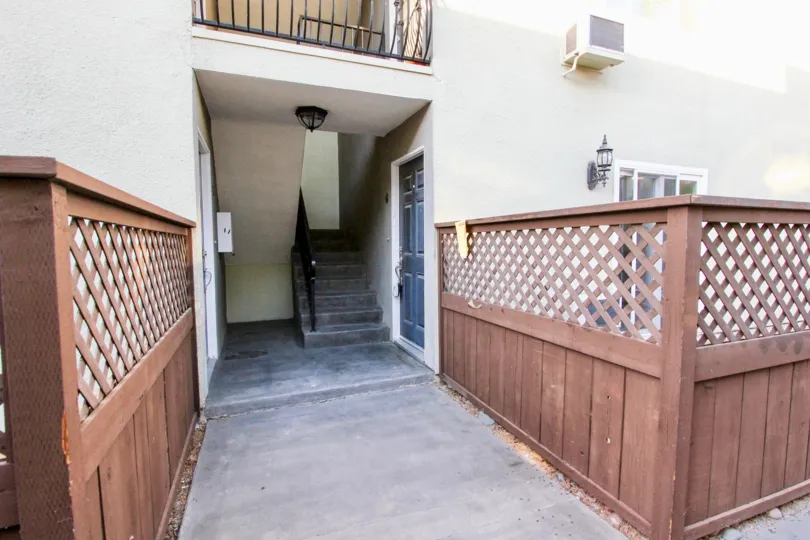 The entrance to the lower level stairwell of an apartment building in Heritage Park West in Clairemont Mesa, California.