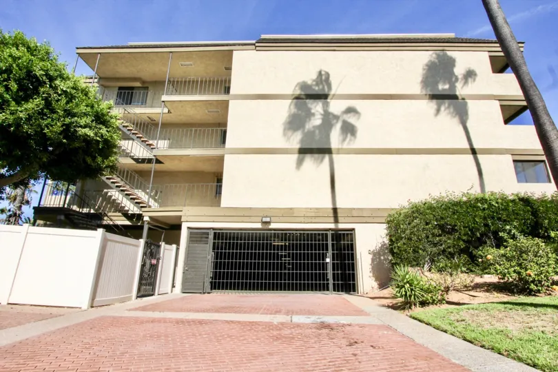 Mission Bay Ridge ,: Clairemont Mesa  , California,tree shadows, beige building