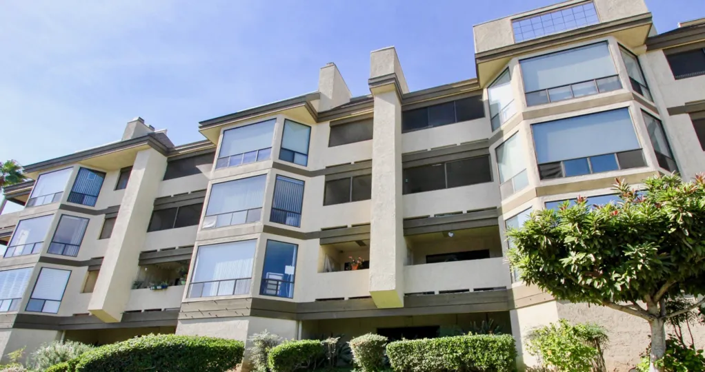 Four story residential building with built in parking at Mission Bay Ridge in Clairemont Mesa California