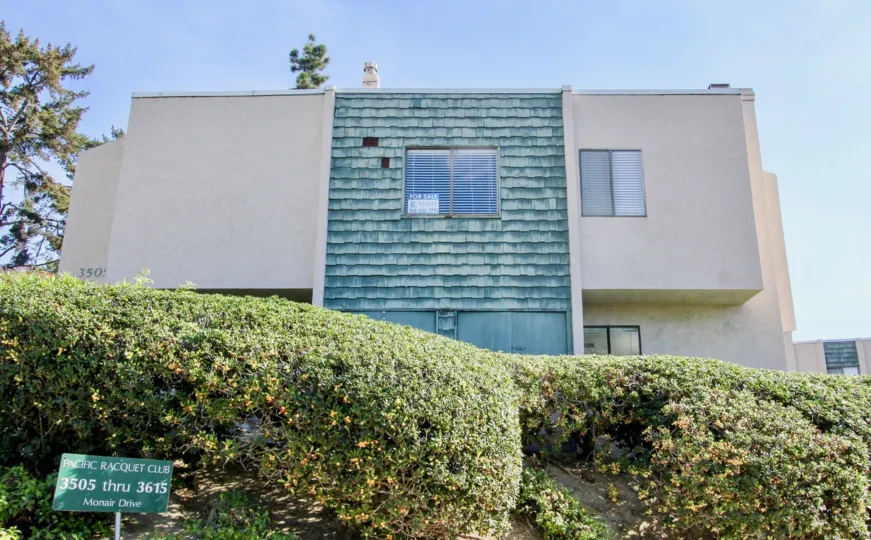 The front of Pacific Racquet Club, a two level building in Clairemont Mesa, California.